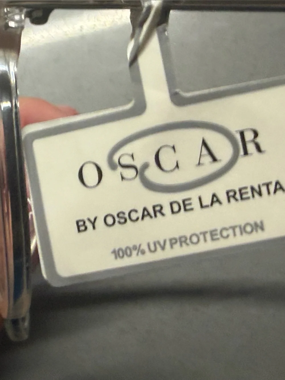 Oscar de la Renta designer clear